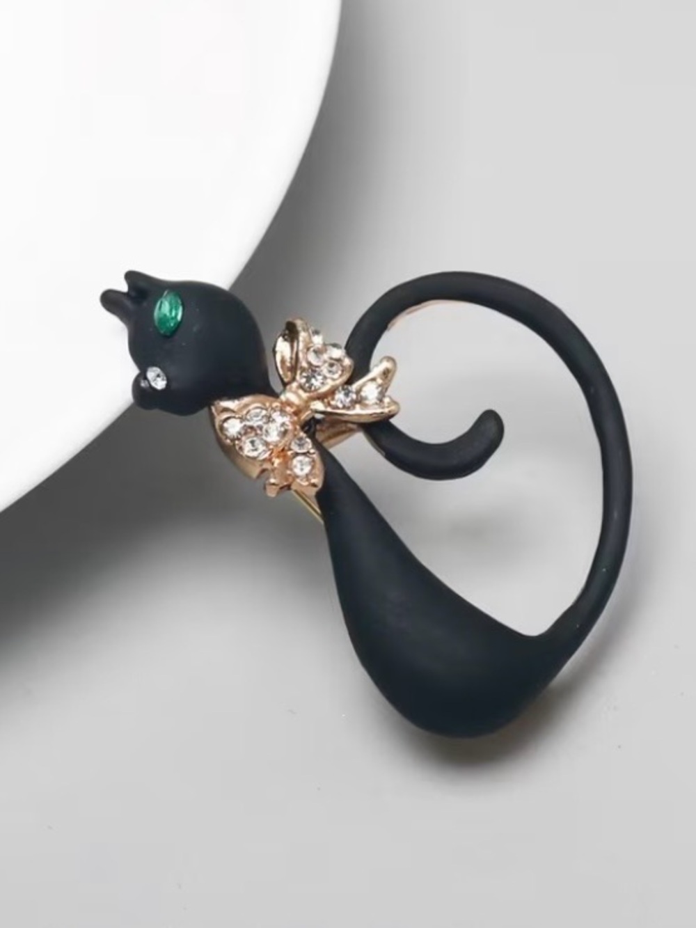 Black Cat Brooch with Gold Rhinestone Bow and Green Eye